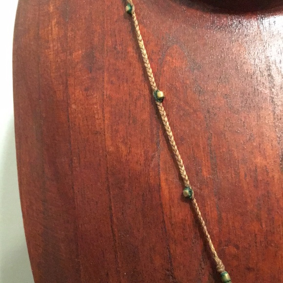 Gold and Black Pendant Necklace with Elegant Design - Picture 4 of 7